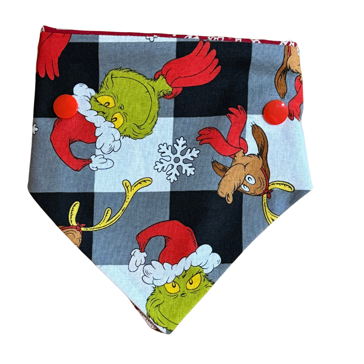 Dog bandana with Grinch design on a checkered background
