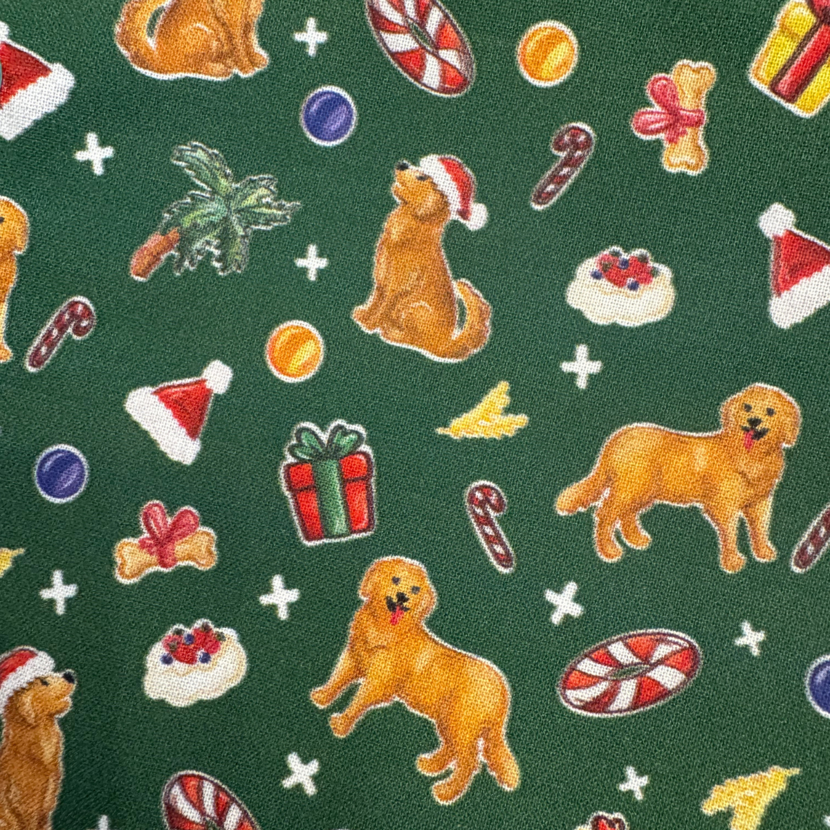 Close-up of Golden Retriever Aussie Christmas pattern on dog bandana