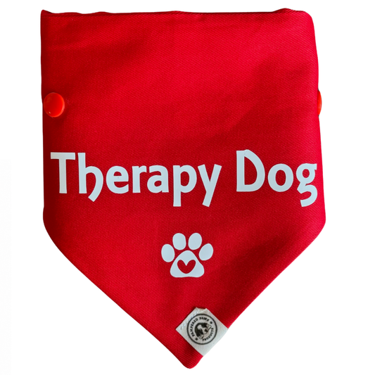 Red therapy dog bandana with “Therapy Dog” text and paw print, adjustable dog bandana for service and support dogs